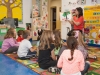 Laura reads to group of children