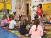 Laura reads to group of children